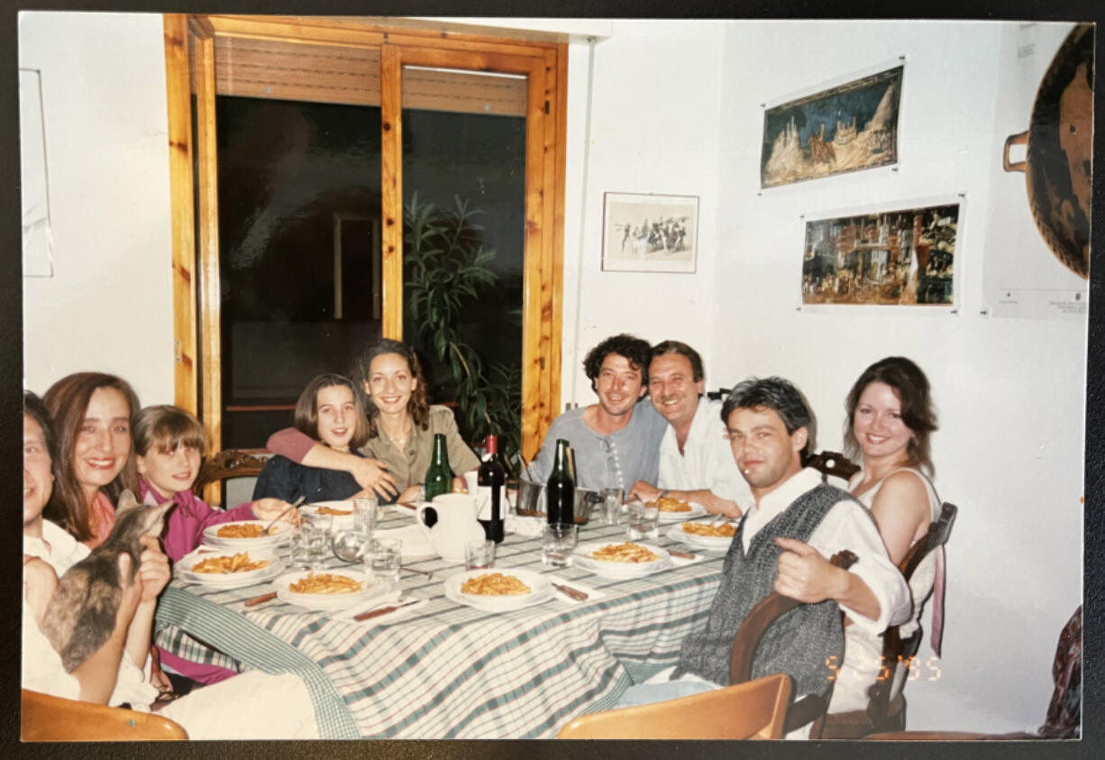Unexpected hospitality and friendship happened when Patty Barnard, taking this photo, and her friend Sheree Walters, far right, opened the wrong door on a street in Florence, Italy, one day in 1995.