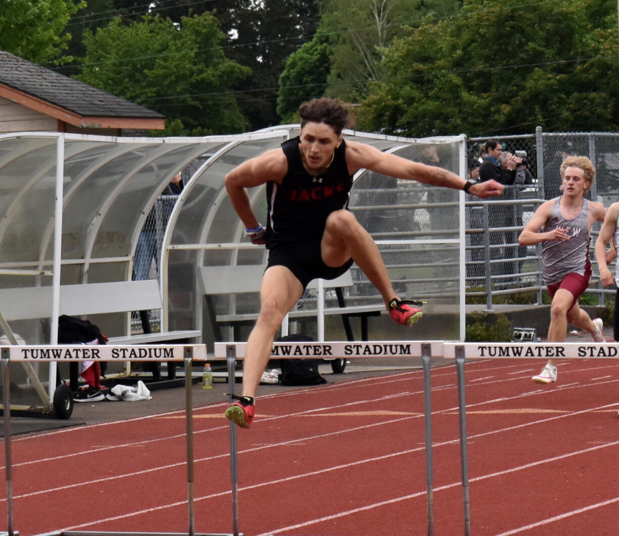 Koynn Williamdyke of R.A. Long competes in the boys 300-meter hurdles at the 2A District 4 track and field championships at Tumwater High School on Friday, May 17, 2024.