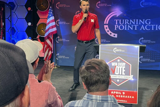Conservative activist Charlie Kirk takes the stage before a rally held by the Nebraska Republican Party calling on Nebraska to switch to a winner-take-all method of awarding Electoral College votes ahead of this year's hotly contested presidential election, Tuesday, April 9, 2024, in Omaha, Neb. Nebraska has five presidential electoral votes, but allows the votes tied to its three congressional districts to be split based on the popular vote within each district. Maine is the only other state to split its electoral votes.