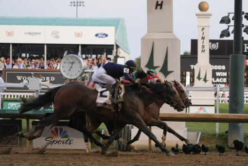 Sierra Leone with jockey Tyler Gaffalione (2), Forever Young with jockey Ryusei Sakai and Mystik Dan with jockey Brian Hernandez Jr., cross the finish line at Churchill Downs during the 150th running of the Kentucky Derby horse race, Saturday, May 4, 2024, in Louisville, Ky.