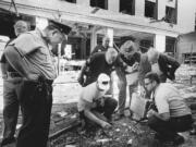 Officials look for clues after a bomb exploded in August 1970 outside the Army Mathematics Research Center in Sterling Hall at the University of Wisconsin in Madison. Forty years after after the Aug. 24, 1970 explosion that killed one, injured others and caused millions in damage, Leo Burt remains the last fugitive wanted by the FBI in connection with radical anti-Vietnam War protest activities.
