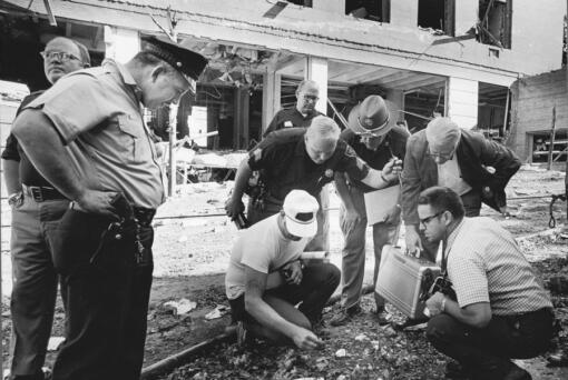 Officials look for clues after a bomb exploded in August 1970 outside the Army Mathematics Research Center in Sterling Hall at the University of Wisconsin in Madison. Forty years after after the Aug. 24, 1970 explosion that killed one, injured others and caused millions in damage, Leo Burt remains the last fugitive wanted by the FBI in connection with radical anti-Vietnam War protest activities.