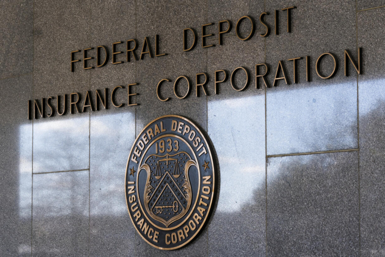 FILE - The Federal Deposit Insurance Corporation (FDIC) seal is shown outside its headquarters, March 14, 2023, in Washington. An independent review released Tuesday, May 7, 2024, of the Federal Deposit Insurance Corp. &#039;s workplace culture describes an environment that fostered &ldquo;hostile, abusive, unprofessional, or inappropriate conduct,&quot; and questions whether the agency&#039;s chairman is credible to lead the agency through a cultural transformation.