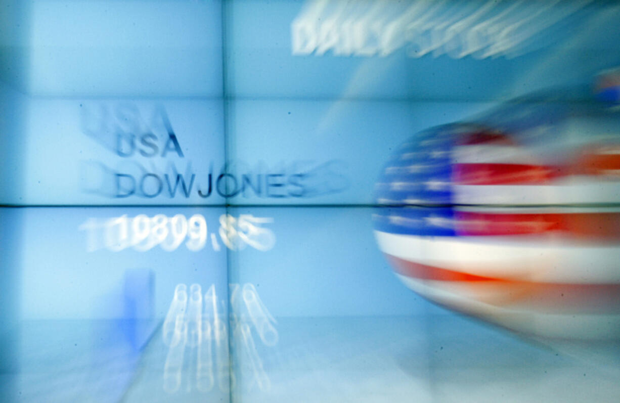 FILE - A screen shows the Dow Jones industrials at in Seoul, South Korea on Aug. 9, 2011. Through its long history, the Dow Jones Industrial Average has offered a way for people to get a quick read on how Wall Street is doing. But its importance is on the wane.