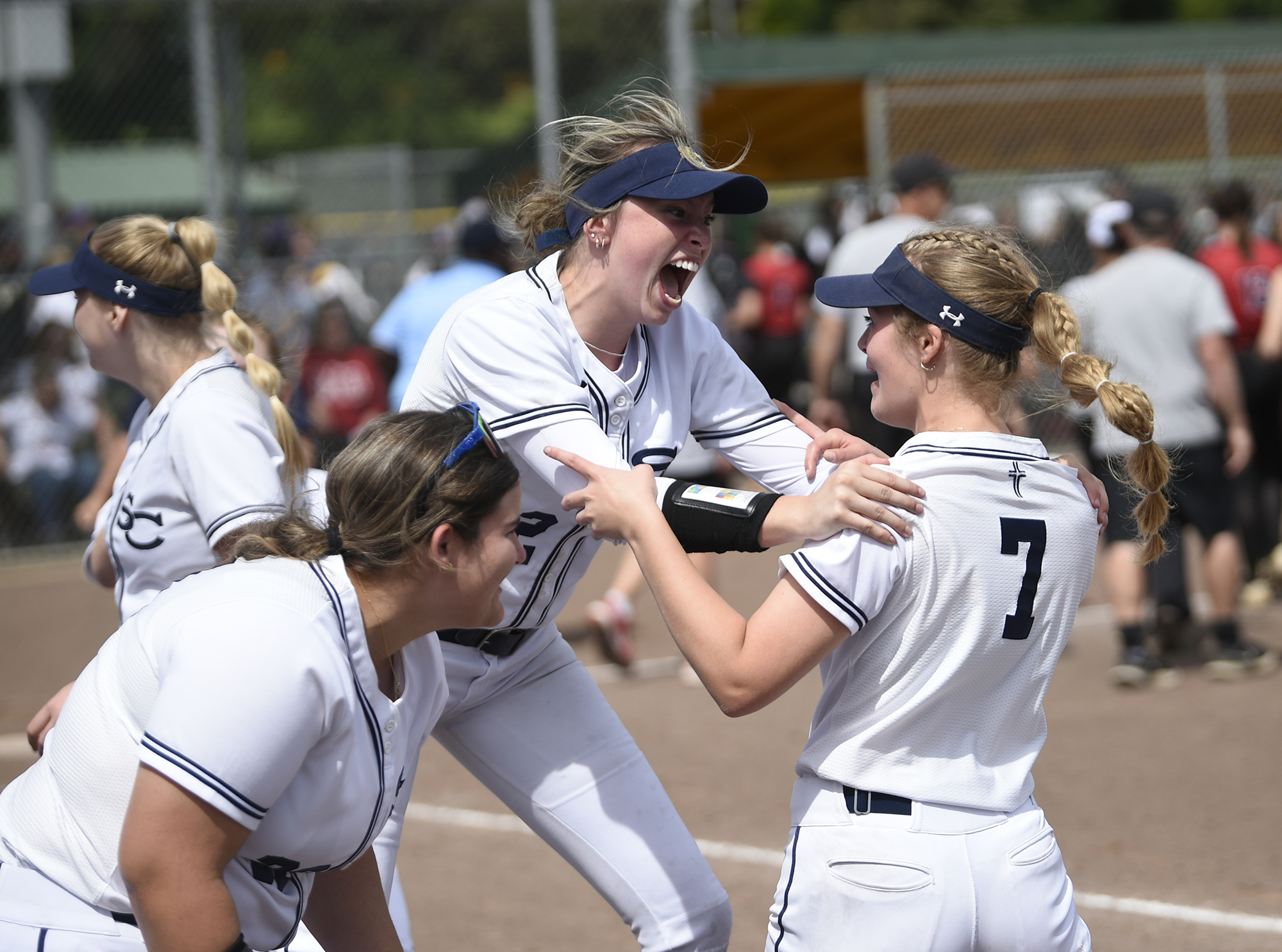 Ellie Forster (left) celebrates with Alyssa Mancuso (7) after Seton Catholic beat Mount Baker in the 1A state softball semifinal game at Columbia Playfields in Richland on Saturday, May 25, 2024.