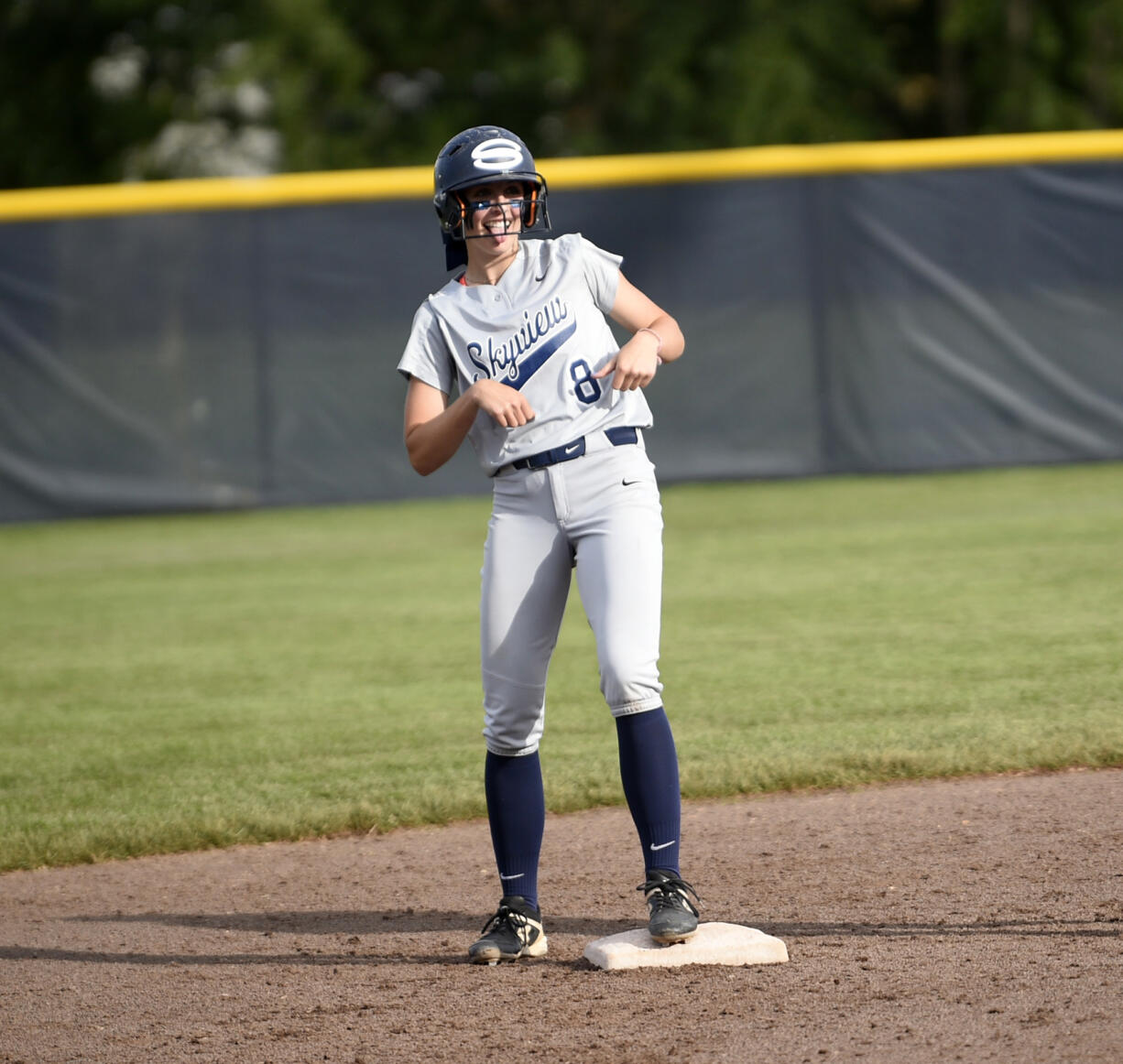 Lainey Phillips of Skyview celebrates her two-run double during a Class 4A state quarterfinal softball game against Emerald Ridge at Columbia Playfields in Richland on Friday, May 24, 2024.