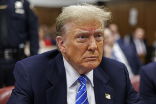 Former President Donald Trump sits in Manhattan criminal court, Monday, May 13, 2024, in New York.