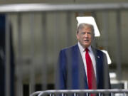 Former President Donald Trump talks to reporters as leaves the courtroom following the day&rsquo;s proceedings in his trial at Manhattan criminal court in New York, Tuesday, April 30, 2024.