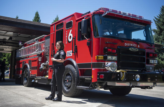 Clark County Fire District 6 Fire Chief Kristan Maurer stands in front of a new fire engine July 13 at Station 62. She said Wednesday that her district doesn';t plan to pursue a development impact fee newly allowed by county code.