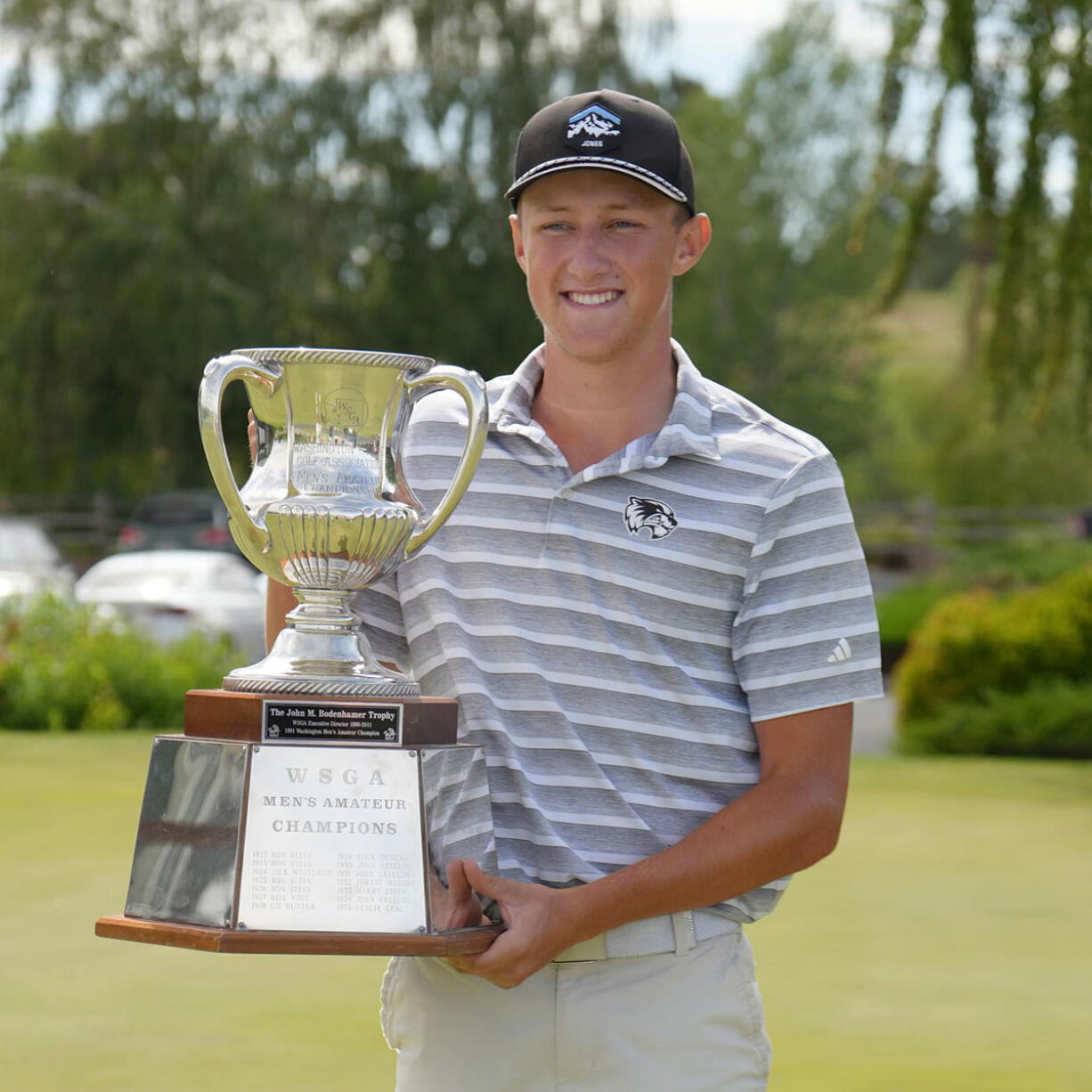 Dane Huddleston poses with the perpetual Washington Men’s Amateur trophy after winning the 103rd Washington Men’s Amateur Championship on Thursday, June 27, 2024, at The Links at Moses Pointe in Moses Lake..