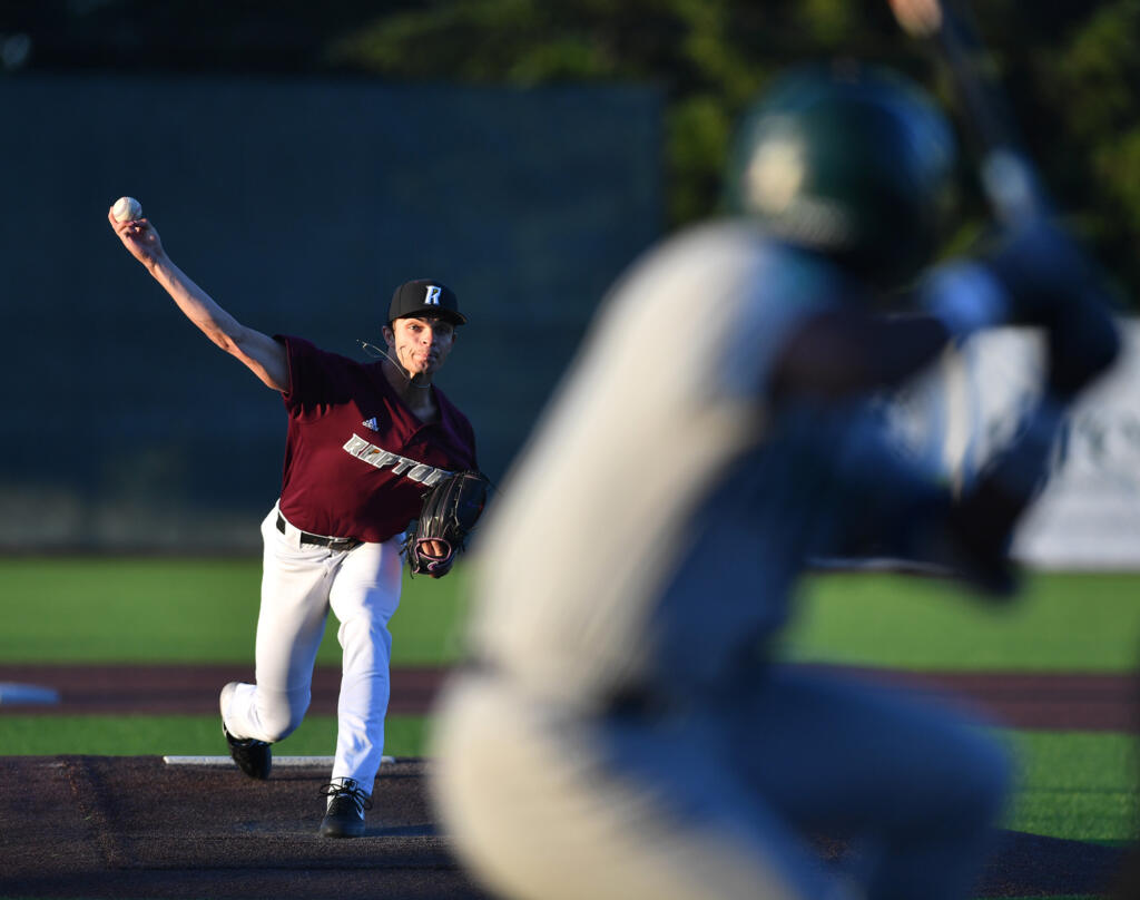 Ridgefield's Curtis Hebert (36) pitches Tuesday June 11, 2024, during the Raptors’ 10-0 win against Yakima Valley Pippins at the Ridgefield Outdoor Recreation Complex.