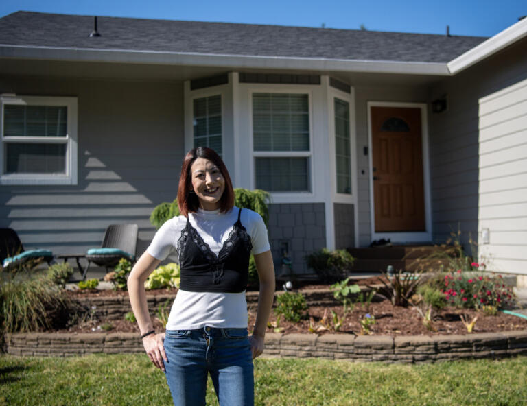Jasmine Yamamoto stands in front of her house that she purchased last summer in Vancouver. Yamamoto recently took tests to become a Realtor in Oregon and Washington. She was inspired by her experience navigating the housing market.