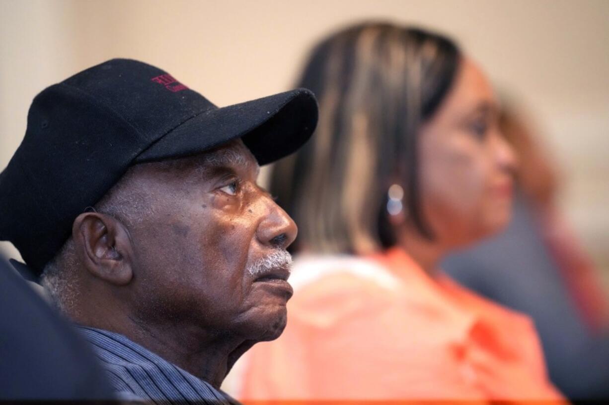 Clarence Picou, 88, right, and his daughter Jackie Andrews, 59, watch the presidential debate between President Joe Biden and former President Donald Trump, Thursday, June 27, 2024, in the Fellowship Hall of the Stronger Hope Church in Jackson, Miss. (AP Photo/Rogelio V.