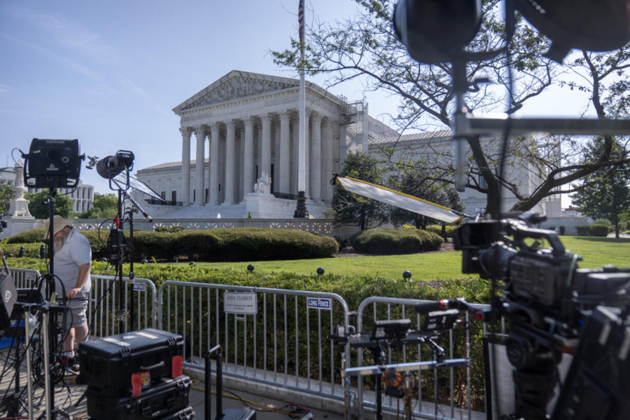 Broadcast media equipment is set up in front of the Supreme Court building on Friday, June 28, 2024, in Washington.